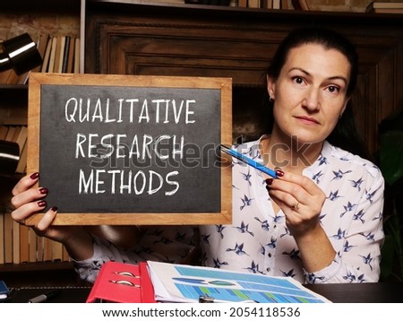 Business concept meaning QUALITATIVE RESEARCH METHODS with inscription on the black board  Photo stock © 