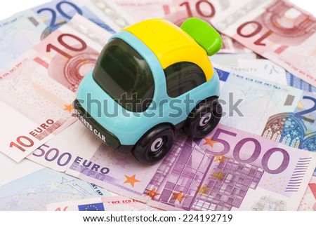 Toy car on euro money