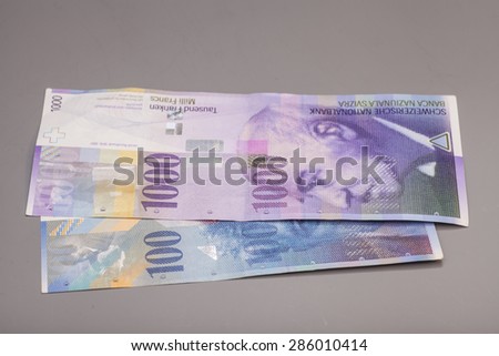 Swiss francs, currency of switzerland isolated on gray