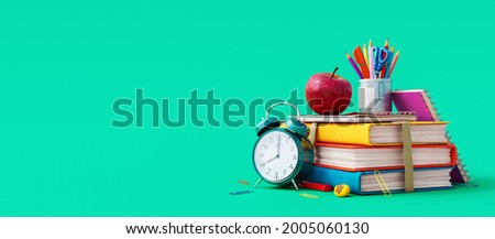 School accessories with apple, books and alarm clock on green background. Back to school concept. 3D Rendering, 3D Illustration
