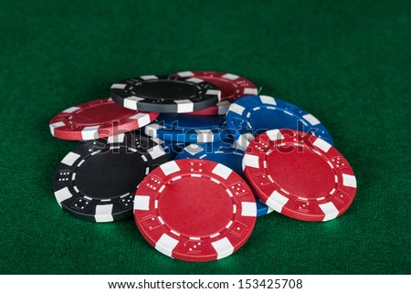 Group of chips on the green cloth.