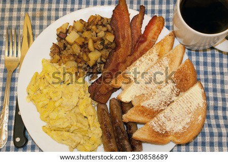 Big Breakfast, Bacon,eggs, sausage,toast,home fries,and coffee.