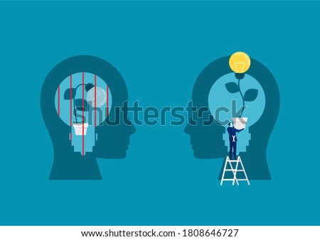 businessman holding light bulb for put think growth mindset different fixed mindset concept