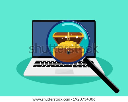 magnifying glass searching for treasure on a laptop