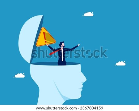 Eliminate notifications from brain. Businessman throws away warning sign from head