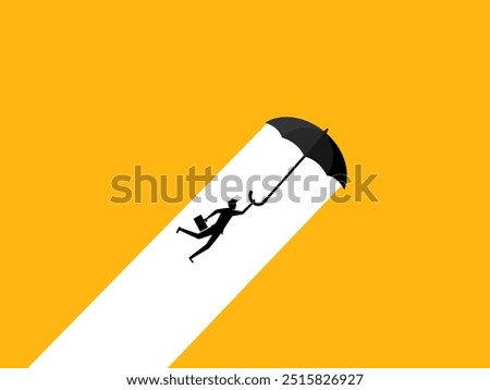 Businessman with umbrella flying in the sky