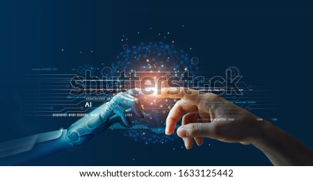 AI, Machine learning, Hands of robot and human touching on big data network connection background, Science and artificial intelligence technology, innovation and futuristic.