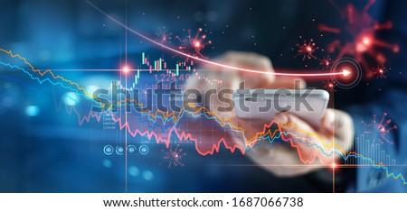 Economic crisis, Businessman using mobile smartphone analyzing sales data and economic graph chart that is falling due to the corona virus crisis, Covid-19, stock market crash caused. 