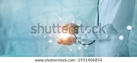 Science of medical, Doctor holding stethoscope and touching on global medical healthcare network connection on modern futuristic hospital background, Medicine, Innovation and technology of medical.