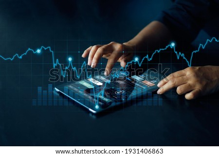 Businessman using tablet online banking, exchange currency and payment, Digital marketing, Finance and banking networking,  Investment of growth on currency rate, Online shopping 