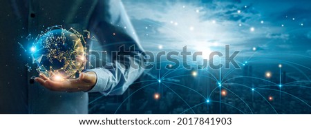 Businessman holding global digital network and data customer connection, Social network and data exchange of technology, Networking structure on blue city background.