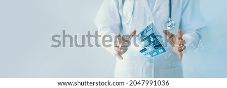 Doctor hold virtual cube medical on network with healthcare icons. Virus pandemic develop people awareness on healthcare and medical technology network enables wellness in patient healthcare. Stock foto © 