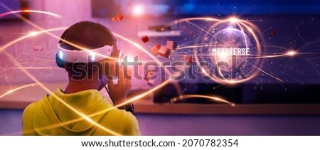 Metaverse Technology concepts. Teenager play VR virtual reality goggle and experiences of metaverse virtual world on colorful. Visualization and simulation, 3D, AR, VR, Innovation of futuristic. Photo stock © 