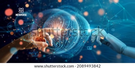 
Metaverse technology, Hand of robot and human connected on network metaverse, Technological transition between human and robots, Virtual reality, Visualization simulation, AI, AR, VR, of futuristic. Foto stock © 