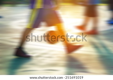 abstract colorful and light basketball players in the park,  motion blur concept