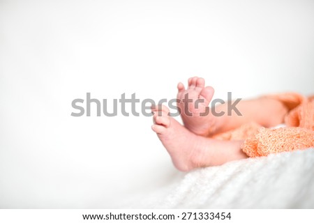 Little feet on white background