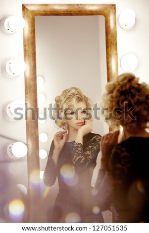 Beauty luxury woman with  and mirror