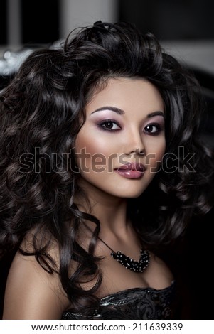 Asian woman. Fashionable modern luxury woman with fashion hairstyle and makeup.