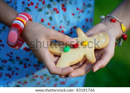 Woman with cookies  man in the hands of
