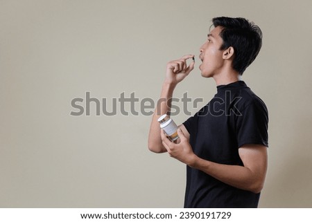 Similar – Image, Stock Photo Young man taking care of his plants on a balcony