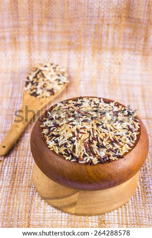Food background with of five rice variety . rice mixture. brown