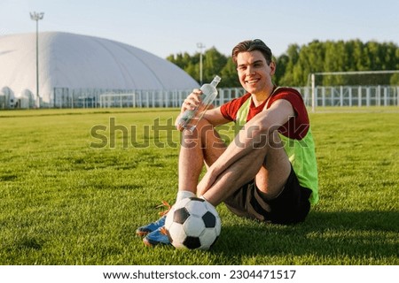 Similar – Image, Stock Photo Young man playing on yellow basketball court outdoor.