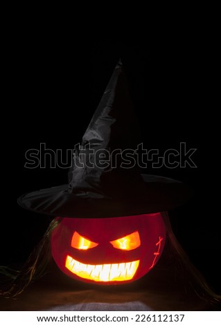 Halloween Jack o\'lantern. Pumpkin carved to create a scary face for Halloween.