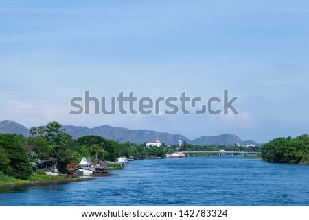 Houses along the river. Residents with waterfront homes. Rivers from the mountains.