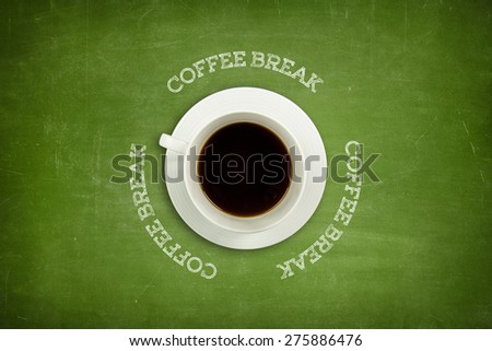 Coffee break text on green blackboard with coffee cup