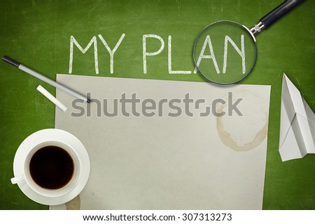 My plan concept on green blackboard with magnifying glass, empty paper sheet and coffee cup
