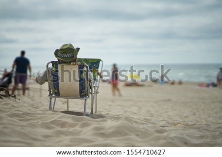 Resting man at the beach. Man relaxing at the beach     商業照片 © 
