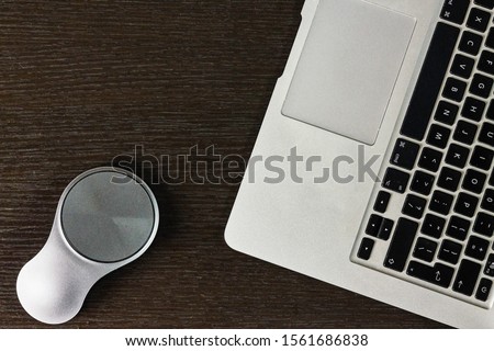 laptop and stylish mouse on table Stok fotoğraf © 