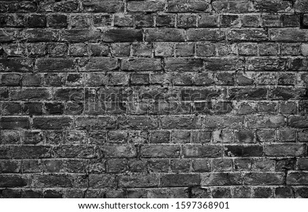 horizontal part of black painted brick wall 商業照片 © 