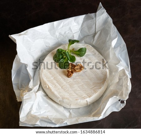 brie cheese in front of white background Сток-фото © 