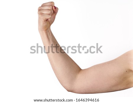 closeup picture of sporty woman flexing her biceps. Сток-фото © 