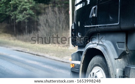 Truck wheel in rotation. Close up photo. Motion blur. Selective focus Stok fotoğraf © 