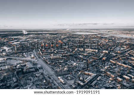 Photo of View at city from bird sight. City from drone. Aerial photo. City scape from drone