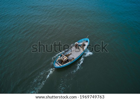 Fishing boats floating on the sea. Fishermans in boat. fishing boat sailing in open waters. man fishing on boat. sailing boat landscape