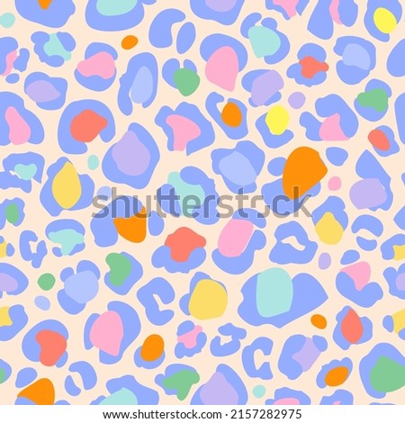 Animal skin print in rainbow colors. Colorful leopard spot seamless pattern design. Abstract blob, rosettes texture Summer ice cream colored vector illustration for surface wrapping, fabric design