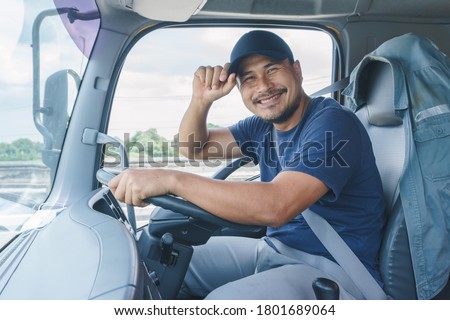 Smile Confidence Young Man Professional Truck Driver In Business Long transport ストックフォト © 