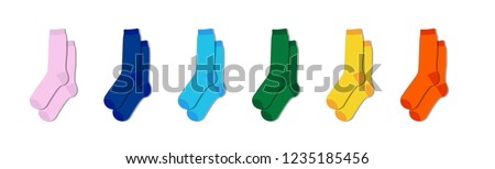 Kids colorful rainbow socks. Children footwear collection. Variety of knitted knee high socks and tights. Child clothing and apparel. Kid fashion. 