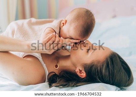 Similar – Image, Stock Photo Mother with her baby at home