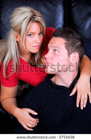 Young Couple Very Much In Love Relaxing At Home