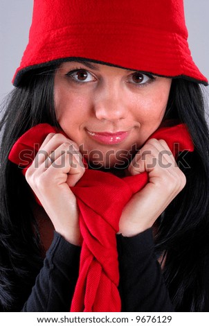 Young Attractive Brunette Young Woman Wearing A Hat And Scarf