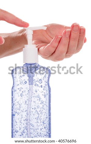 Woman Pumping Gel Hand Sanitizer From A Bottle, Concept For Swine Flu H1-N1