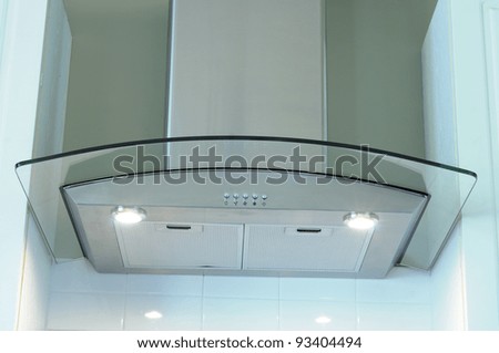 A Modern Stainless Steel And Glass Range Hood Extractor Fan