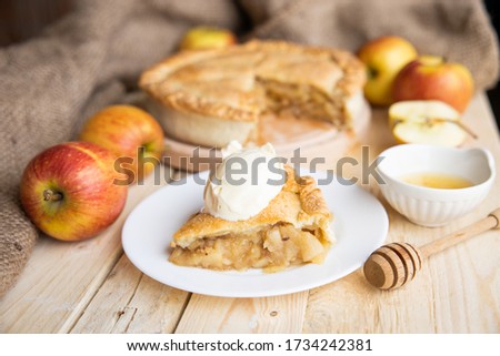 Similar – Image, Stock Photo Apple pie with ice cream and cup of coffee. Top view of apple tart slice
