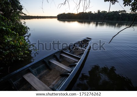 View of a boat parked on the river bank, in Tambopata national park of PerÃ?Âº.