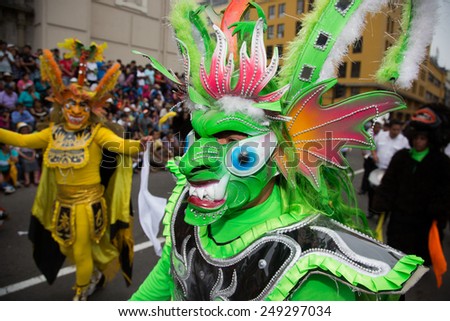 LIMA, PERU - CIRCA 2015: Dancer with mask at Virgen de la Candelaria  parade circa 2015 in Lima, Peru.