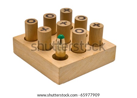 Wooden Tic Tac Toe game with one bullet hinting at the senseles war games